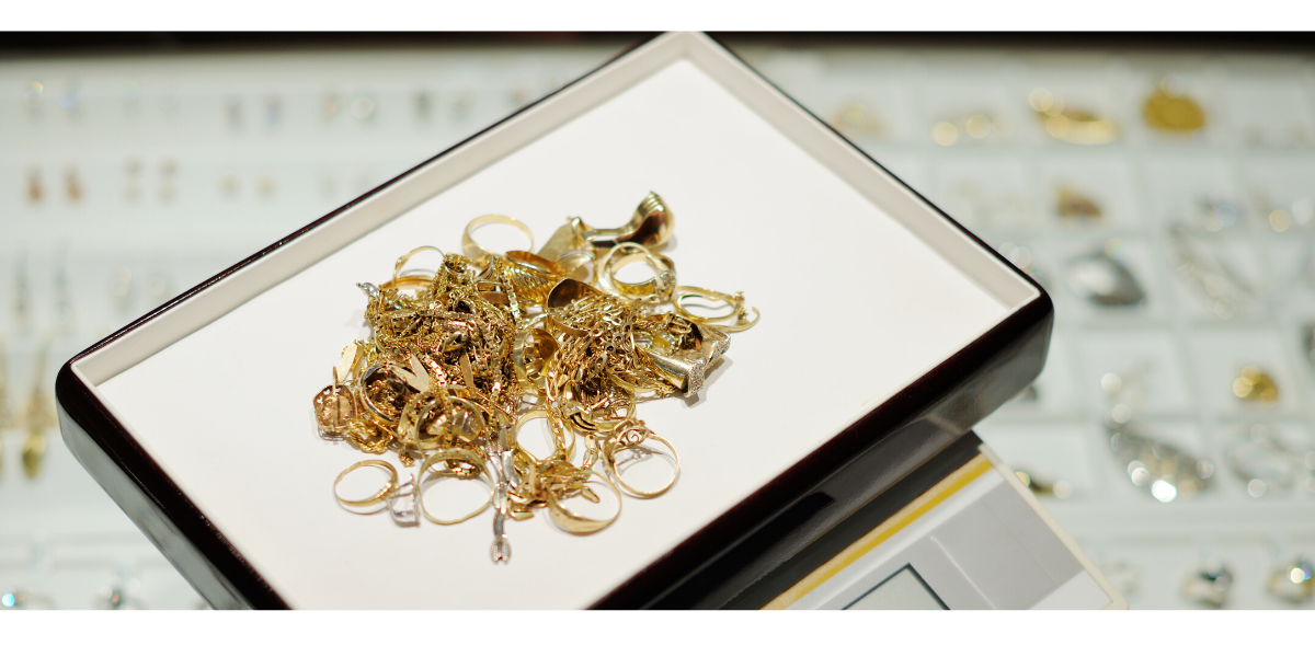 Image of a pile of miscellaneous gold jewelry, including rings, necklaces, bracelets, and earrings. This image represents the types of gold jewelry that Gold Rush Houston buys from customers. We Buy Gold, Silver, & Diamonds - Old, Unwanted, Broken, Ugly, Or Shiny and New